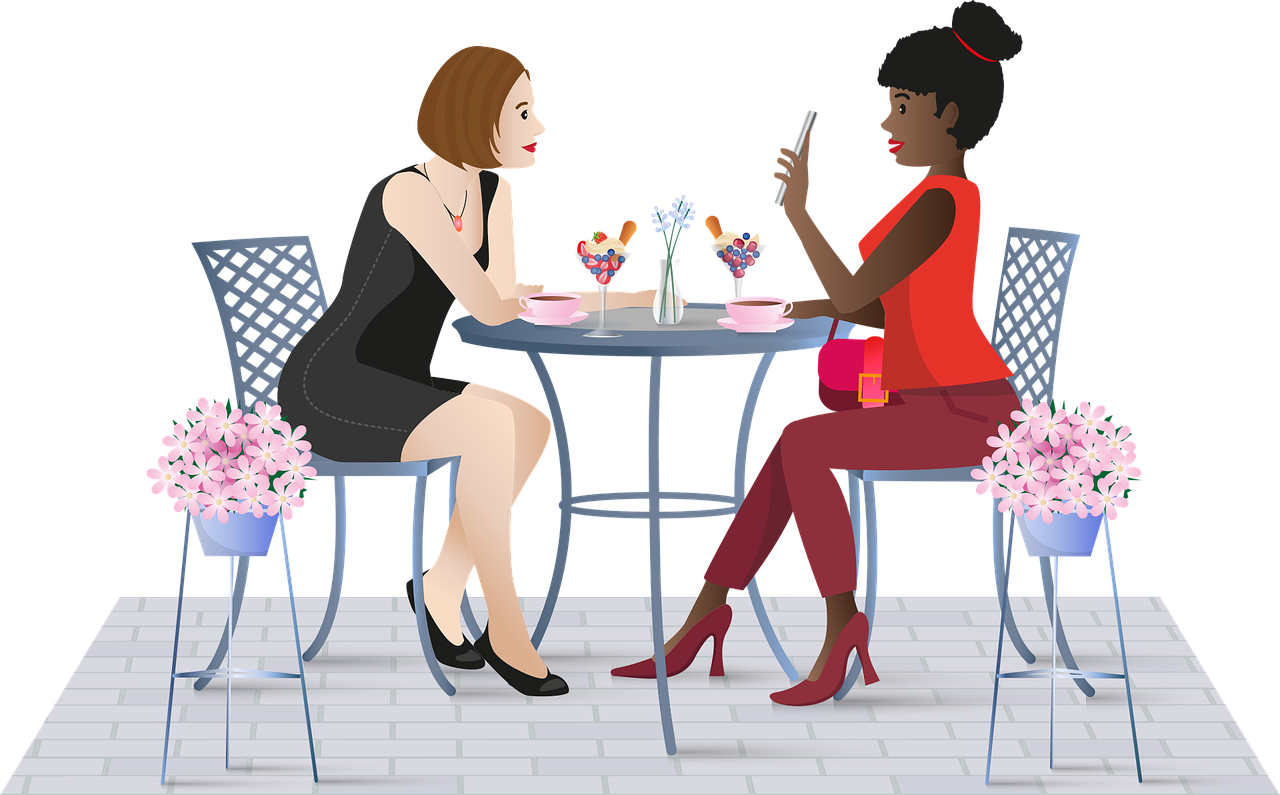 Women in tech speaking at a restaurant